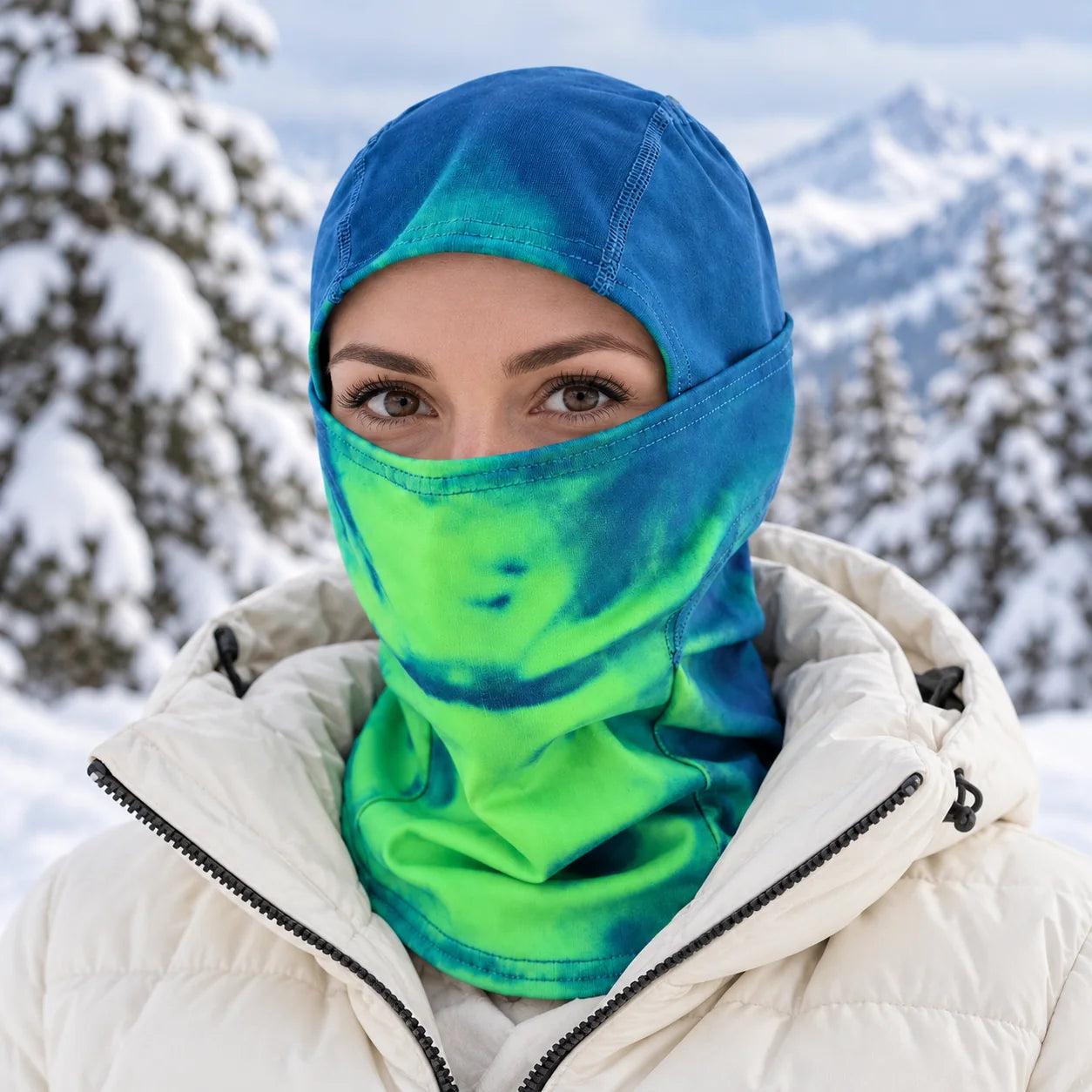 Chameleon Ski Mask covering the head, face and neck in a snowy setting